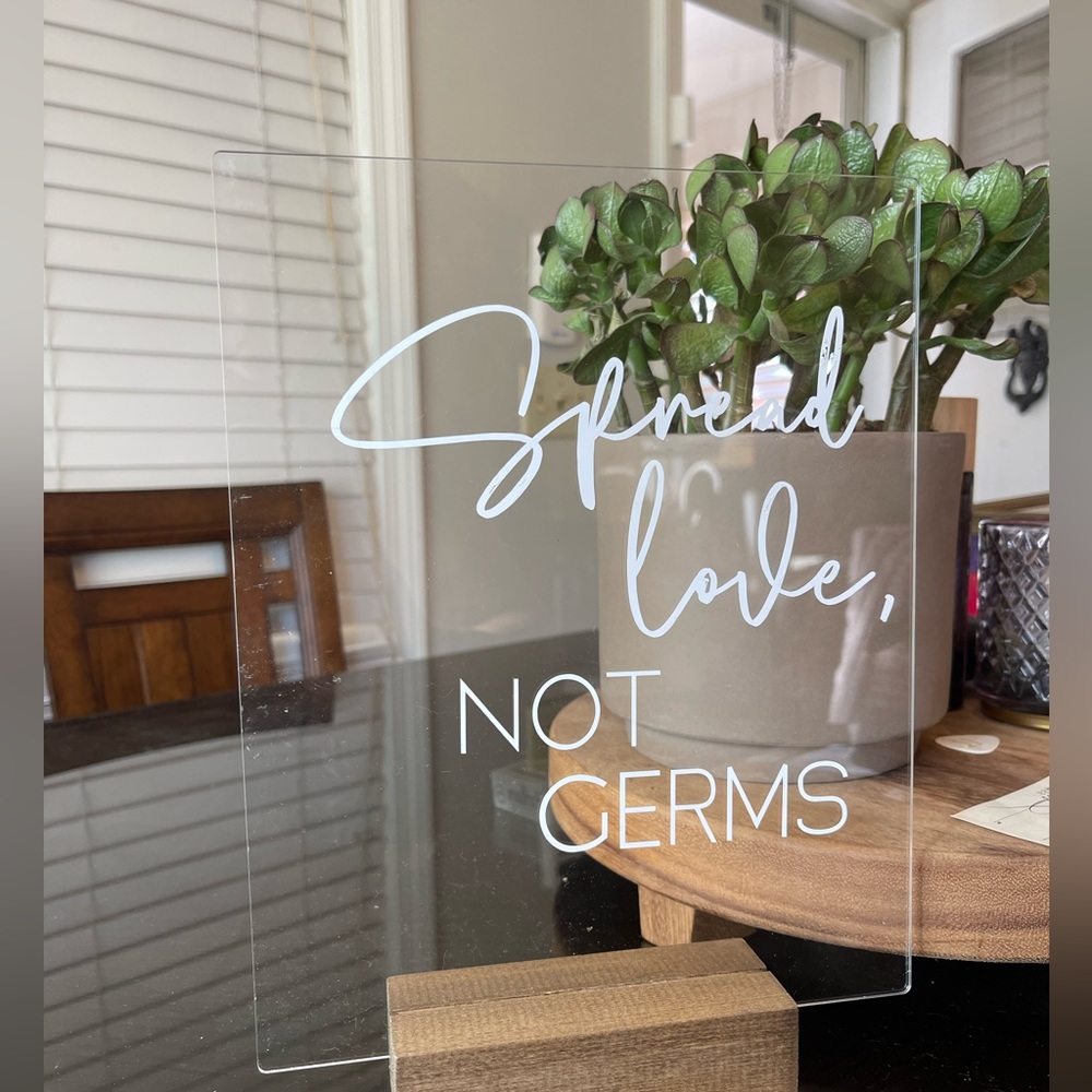 Acrylic 8x10 “Spread Love, Not Germs” wedding sign with wood block holder